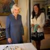 Camilla Parker Bowles, duchesse de Cornouailles célébrait les cinq ans de l'association First Story, accompagnée de la fondatrice Katie Waldegrave à Londres le 23 avril 2013