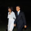 Barack Obama et sa femme Michelle Obama rentrent à Washington après avoir assisté à l'inauguration du George W. Bush Presidential Library à Dallas au Texas, le 25 avril 2013.