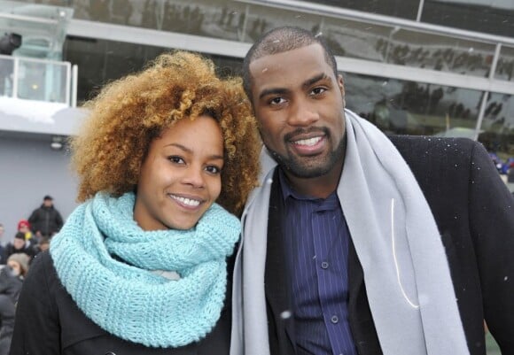 Teddy Riner et sa compagne Luthna à l'hippodrome de Paris-Vincennes le 20 janvier 2013