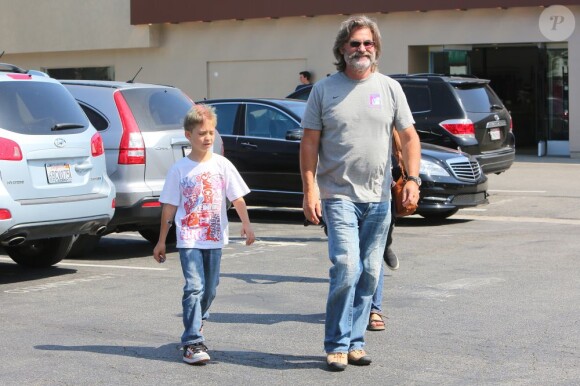 Kurt Russell et son petit-fils Ryder, le 11 mai 2013 à Malibu.
