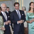  Le roi Carl XVI Gustaf et la reine Silvia avec la princesse Madeleine de Suède et son fiancé Chris O'Neill au palais royal à Stockholm le 19 mai 2013 lors de la réception organisée à l'occasion de la publication de leurs bans, à trois semaines de leur mariage le 8 juin. 