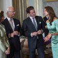  La princesse Madeleine de Suède et son fiancé Chris O'Neill au palais royal à Stockholm le 19 mai 2013 lors de la réception organisée à l'occasion de la publication de leurs bans, à trois semaines de leur mariage le 8 juin. 