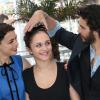 Bérénice Bejo, Tahar Rahim et Pauline Burlet lors du photocall du film "Le Passé" au 66e Festival International du Film de Cannes le 17 mai 2013
