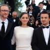 James Gray, Marion Cotillard et Jeremy Renner lors de la montée des marches du film "The Immigrant", lors du 66e festival du film de Cannes, le 24 mai 2013