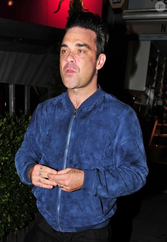Robbie Williams après son dîner avec Sarah Ferguson et ses filles à Londres, le 31 mai 2013.