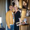 Paul et Luana Belmondo lors de l'exposition Ecris-moi des mots d'Amour, par Alejandra di Andia, photos de Ian Abela, à la boutique Montblanc, le 4 juin 2013.