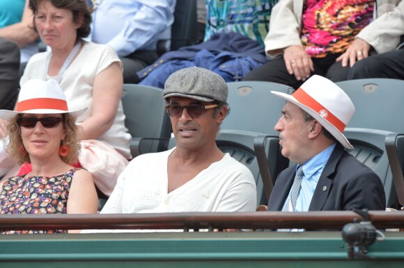 Yannick Noah et Jean Gachassin lors du onzième jour des Internationaux de France à Roland-Garros, le 5 juin 2013
