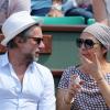 Valérie Benguigui et son époux lors du onzième jour des Internationaux de France à Roland-Garros, le 5 juin 2013