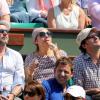 Valérie Benguigui, son époux et Lionel Abelanski lors du onzième jour des Internationaux de France à Roland-Garros, le 5 juin 2013