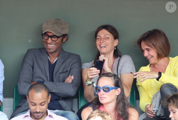 Manu Katché et sa femme Laurence lors du onzième jour des Internationaux de France à Roland-Garros, le 5 juin 2013