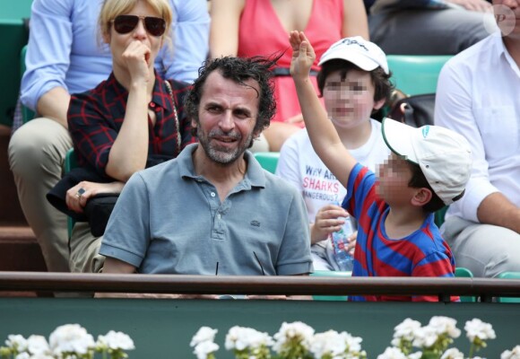 Marina Foïs, Eric Lartigau et leurs enfants lors du onzième jour des Internationaux de France à Roland-Garros le 5 juin 2013