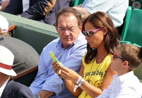 Jean-Pierre Pernaut et Nathalie Marquay lors du onzième jour des Internationaux de France à Roland-Garros le 5 juin 2013