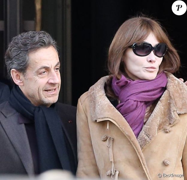 Nicolas Sarkozy et Carla Bruni-Sarkozy à la sortie du Royal Monceau, à Paris, le 9 février 2013.