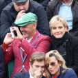 Christian Louboutin et Melita Toscan du Plantier, Laurence Ferrari et son mari Renaud Capucon  - finale opposant Rafael Nadal à David Ferrer au tournoi de Roland-Garros, à Paris le 9 juin 2013.   