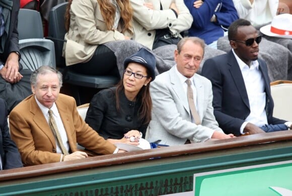 Jean Todt, Michelle Yeoh, Bertrand Delanoë et Usain Bolt - finale opposant Rafael Nadal à David Ferrer au tournoi de Roland-Garros, à Paris le 9 juin 2013.  