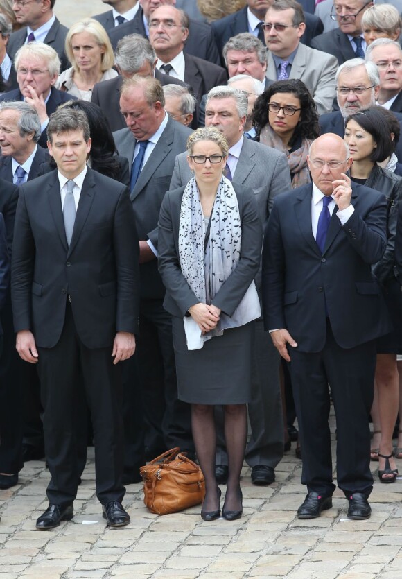 Arnaud Montebourg, Delphine Batho, Michel Sapin lors de l'hommage de la Nation à Pierre Mauroy, le 11 juin 2013 aux Invalides à Paris