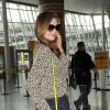 Miranda Kerr arrive à l'aéroport JFK à New York, le 14 juin 2013