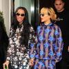 Rihanna, habillée d'un ensemble aux motifs floraux Chrostpher Kane et de sandales Manolo Blahnik, quitte son hôtel avec sa meilleure amie Melissa Forde. Le 16 juin 2013.