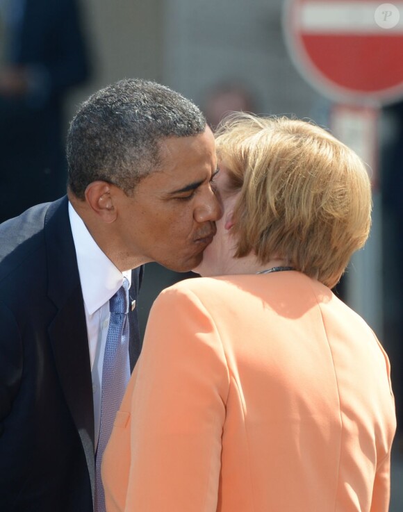 Barack Obama et Angela Merkel devant la Porte de Brandenbourg à Berlin, le 19 juin 2013.