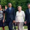 Michelle Obama, Barack Obama, Angela Merkel et son mari Joachim Sauer prennent la pose ensemble avant le dîner officiel organisé au palace Charlottenburg à Berlin, le 19 juin 2013.