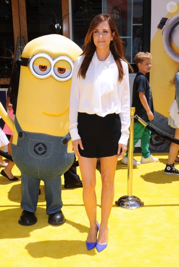 Kristen Wiig ravissante au côté d'un Minion à la première de Moi, moche et méchant 2 à Los Angeles, le 22 juin 2013.