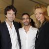 Marc Jacobs entouré d'Antoine et Delphine Arnault en 2011