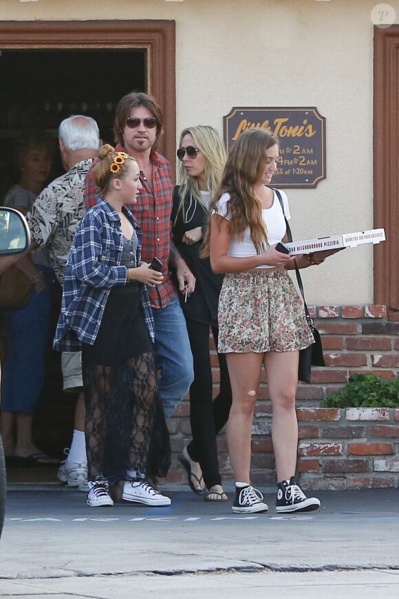 Billy Ray Cyrus et sa future ex-femme Tish looked avec leur fille Noah à North Hollywood, Los Angeles, le 23 juin 2013.