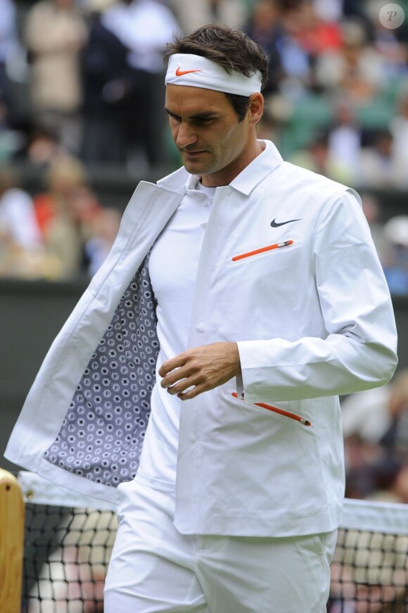Le tennisman Roger Federer lors de son entrée à Wimbledon à Londres le 24 juin 2013.