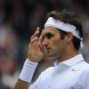 Roger Federer lors de son entrée à Wimbledon à Londres le 24 juin 2013.