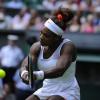Serena Williams a rapidement rangé sa crinière en chignon durant son premier match de Wimbledon face à Mandy Minella le 25 juin 2013 à Londres