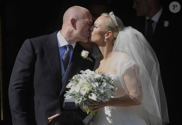 Zara Phillips et Mike Tindall lors de leur mariage à Edimbourg le 30 juillet 2011. Buckingham Palace a annoncé le 8 juillet que le couple attend un bébé, son premier enfant, pour le début d'année 2014.