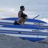 Kendall Jenner et son frère Brody Jenner font du surf, à Malibu, pour les besoins de la télé réalité Keeping Up With The Kardashians, le 8 juillet 2013.
