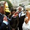 Le tigre Charles contre l'éléphante Camilla... Le prince Charles et son épouse Camilla, duchesse de Cornouailles, organisaient le 10 juillet 2013 une réception à Clarence House au profit de The Elephant Family, association oeuvrant pour la préservation de l'éléphant d'Asie. Les tops Cara Delevingne et Jerry Hall faisaient partie des convives de cet étonnant bal masqué animalier.