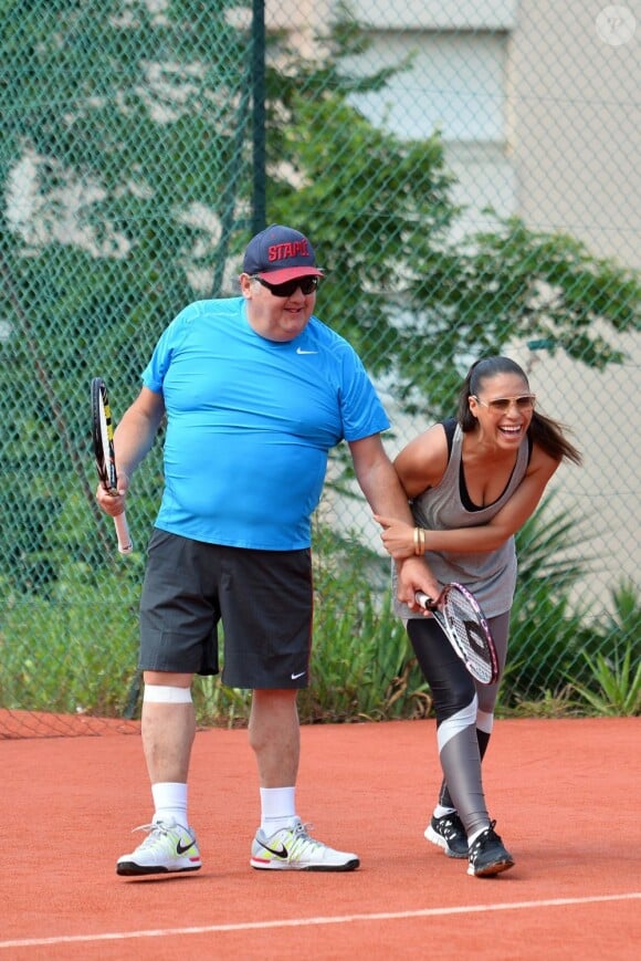 Pierre Ménès et Zaho au tournoi de tennis de l'association Enfant star et match à Juan les Pins, le 9 juillet 2013.