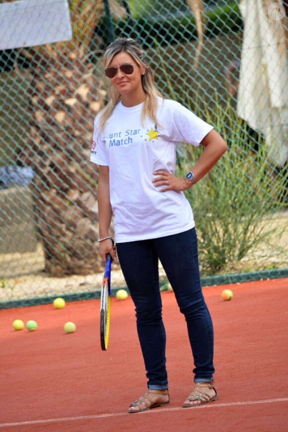 Priscilla au tournoi de tennis de l'association Enfant star et match à Juan les Pins, le 9 juillet 2013.