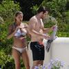 Michelle Hunziker enceinte, profite de ses vacances à Ibiza avec son compagnon Tomaso Trussardi, le 20 juillet 2013