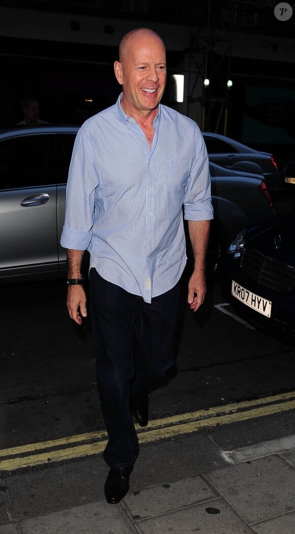 Bruce Willis tout sourire au C Restaurant à Londres le 21 juillet 2013.