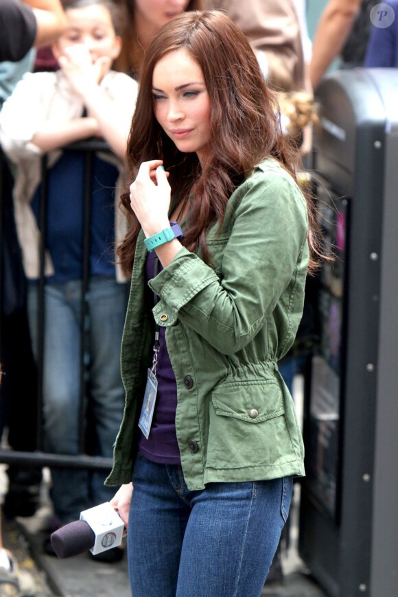 Megan Fox sur le tournage de Teenage Mutant Ninja Turtle à Times Square, New York, le 22 juillet 2013.