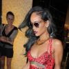 La chanteuse Rihanna est allée faire du shopping chez Roberto Cavalli. Le 19 juillet 2013. La chanteuse toujours sexy dévoile ici un look sauvage.