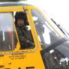 Le prince William de retour en août 2013 à ses fonctions de pilote d'hélicoptère de secours à RAF Valley après deux semaines de congé paternité suite à la naissance du prince George de Cambridge.