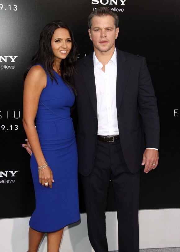 Matt Damon et sa femme Luciana Barroso en couple à la première du film Elysium à Westwood, le 7 août 2013.