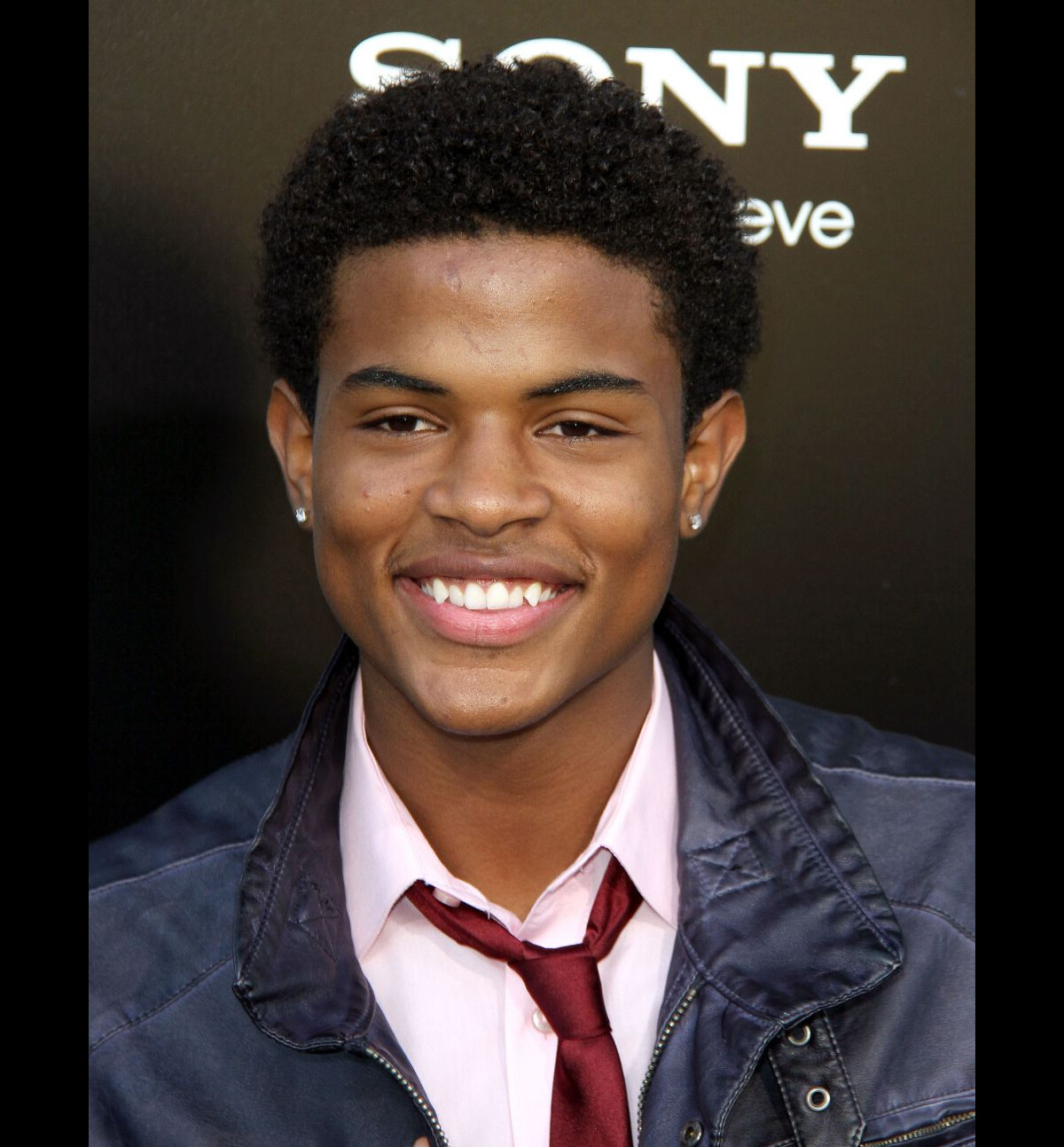 Photo : Trevor Jackson à la première du film Elysium à Westwood, le 7 ...