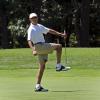 Barack Obama en vacances en pleine partie de golf sur le Farm Neck Golf Club de Oak Bluffs, le 11 août 2013