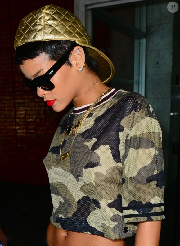 Rihanna en août 2013 porte une coupe garçonne au lissé impeccable