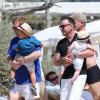 Elton John, son époux David Furnish, et leurs deux fils Elijah et Zachary, en vacances en famille à Saint-Tropez, le 22 août 2013.