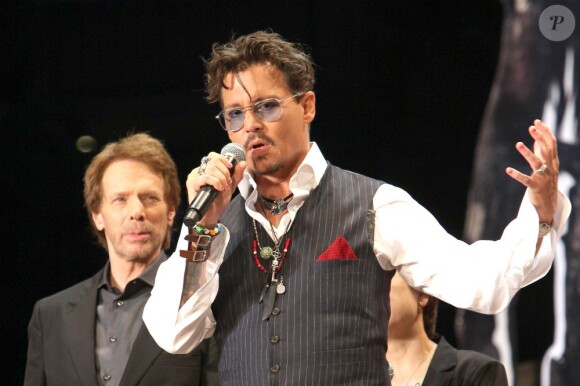 Jerry Bruckheimer et Johnny Depp à Tokyo, le 17 juillet 2013.