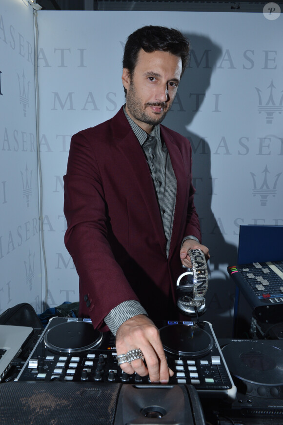 Matteo Ceccarini, aux platines lors du cocktail organisé par L'Uomo Vogue à la Terrazza Maserati, célébrant le début de la 70e Mostra de Venise. Le 27 août 2013.