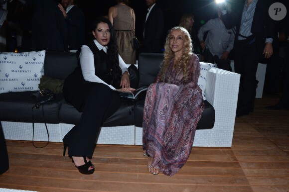 Marina Abramovic et Franca Sozzani lors du cocktail organisé par L'Uomo Vogue à la Terrazza Maserati, célébrant le début de la 70e Mostra de Venise. Le 27 août 2013.