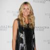 Heidi Klum, sublime en gilet BCBG, legging en cuir et souliers Saint Laurent, assiste au défilé BCBGMAXAZRIA printemps-été 2014 au Theatre du Lincoln Center. New York, le 5 septembre 2013.
