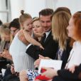 David Beckham et sa fille Harper assistent au défilé printemps-été 2014 de Victoria Beckham. New York, le 8 septembre 2013.